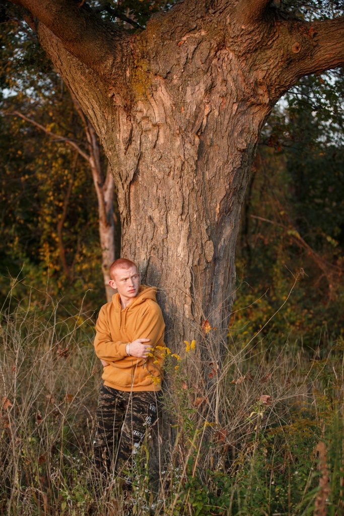 fall senior photo boy by tree