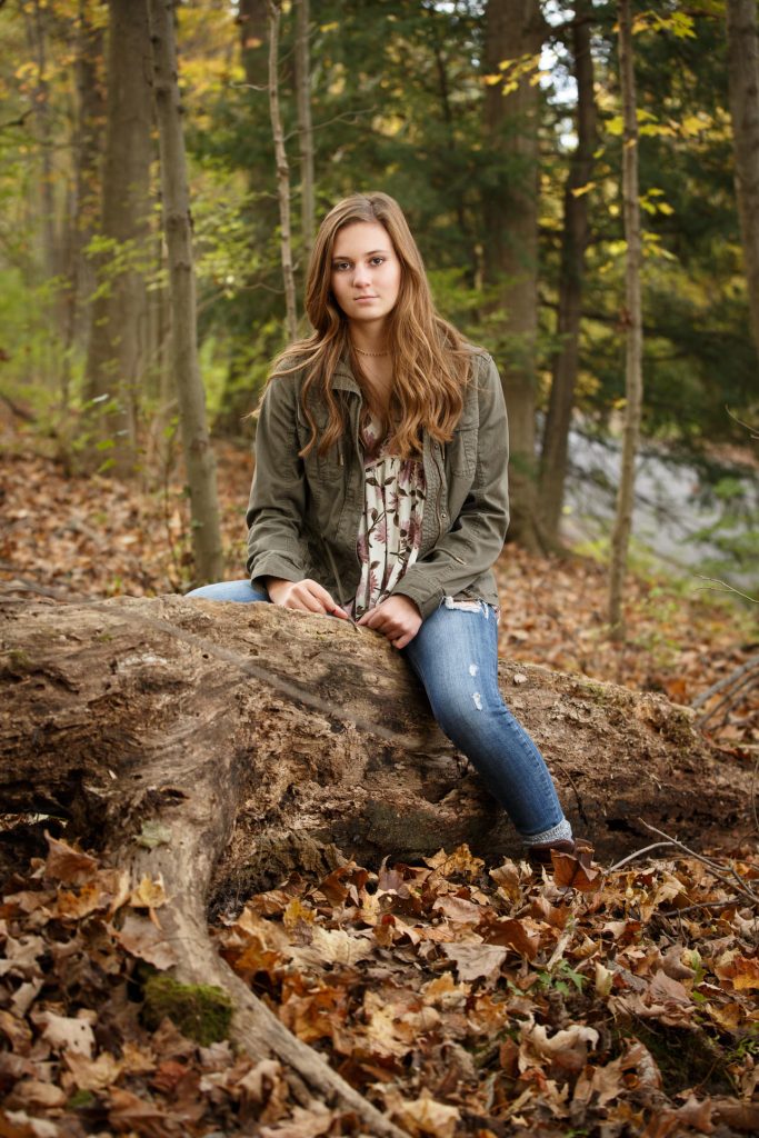 fall senior photo girl woods